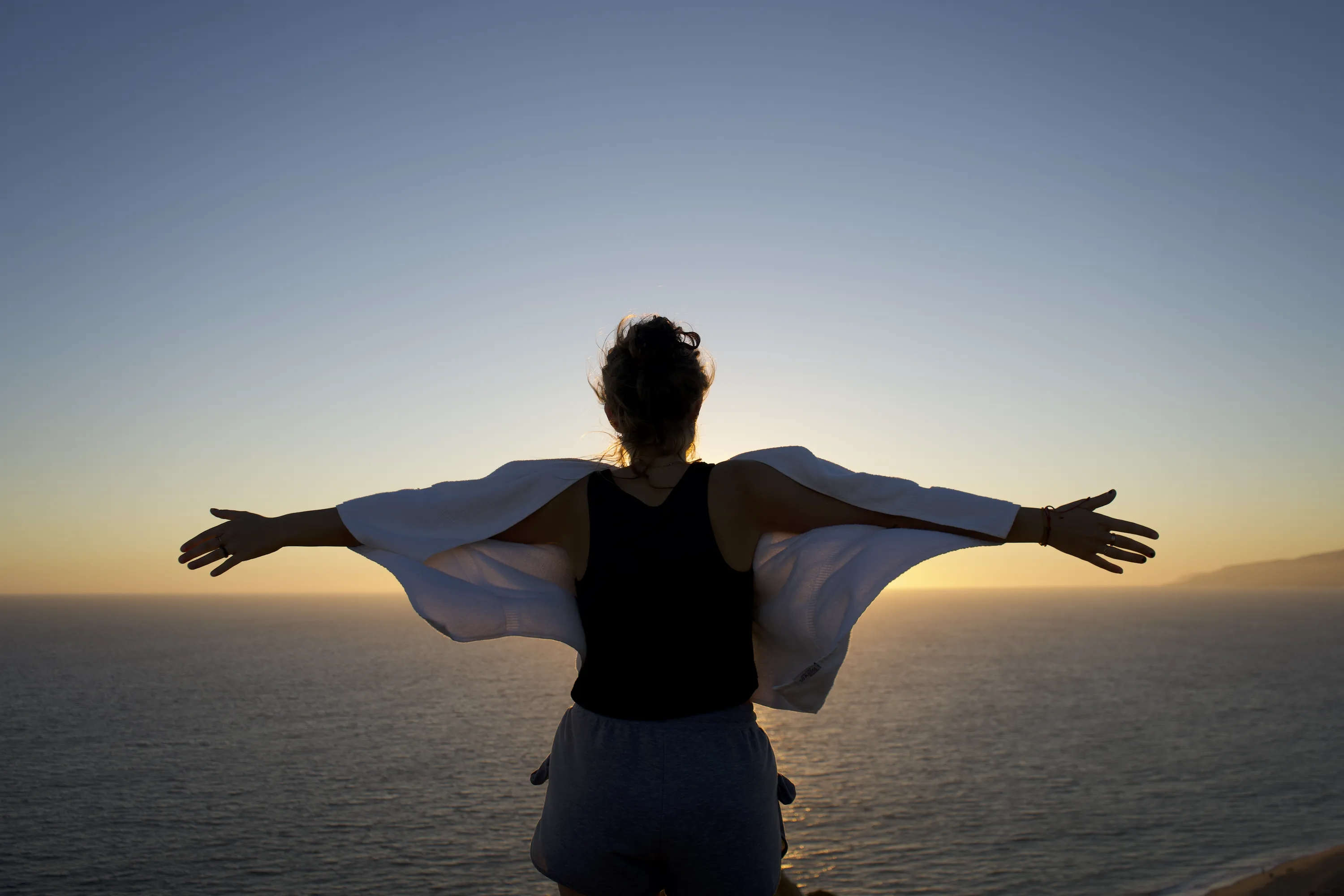 German tourist during golden hour in Malibu, CA, USA