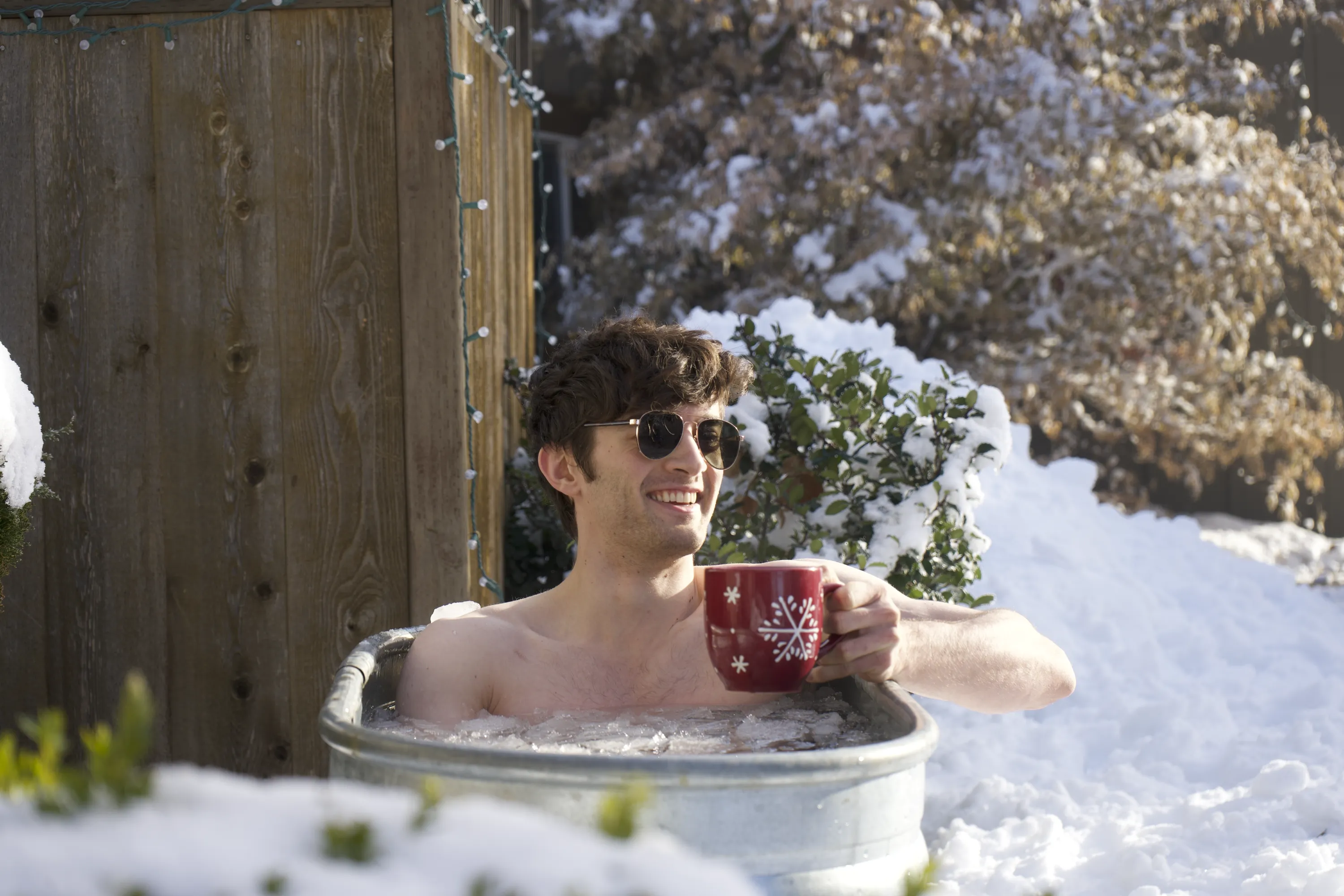 Washingtonian in icy water trough in Ellensburg, WA, USA